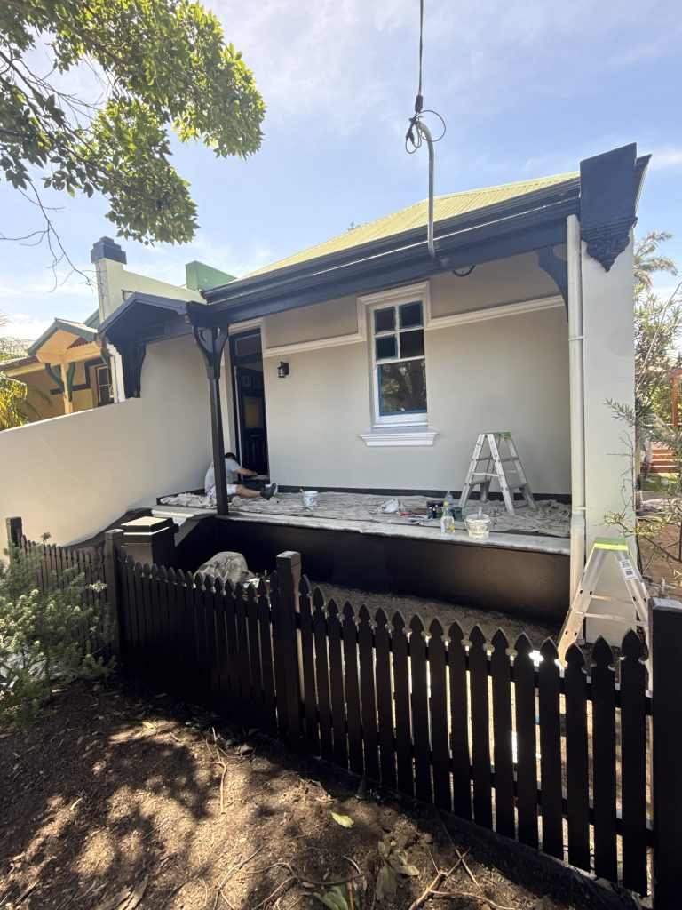 External House Painting in Newcastle showing one of the team members painting